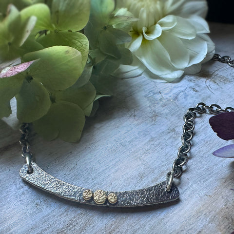 Chunky silver arc necklace w/3 18k gold Rondels