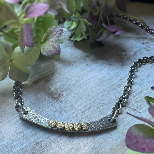 Chunky Silver arc necklace w/5 18k gold Rondels